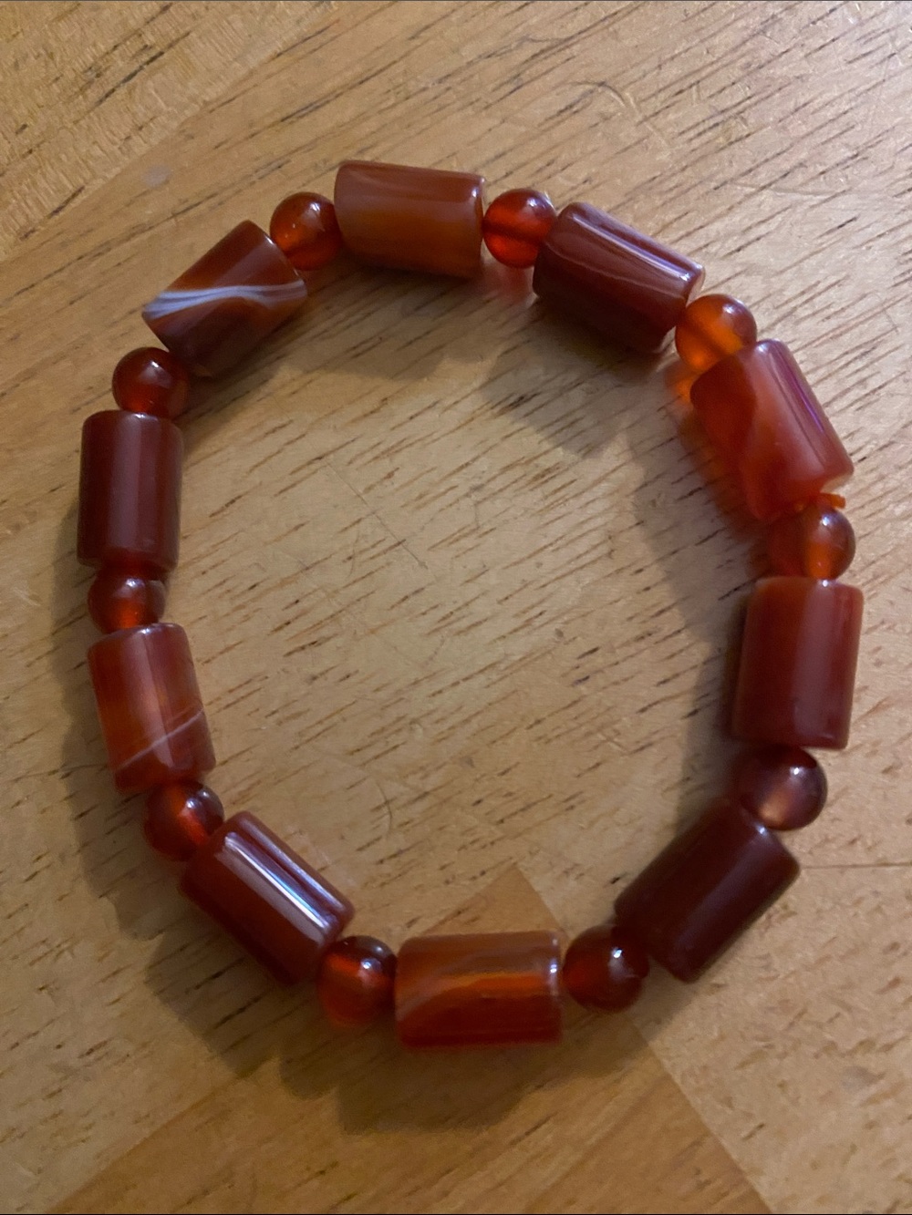 V! Red tone bracelet pre-owned